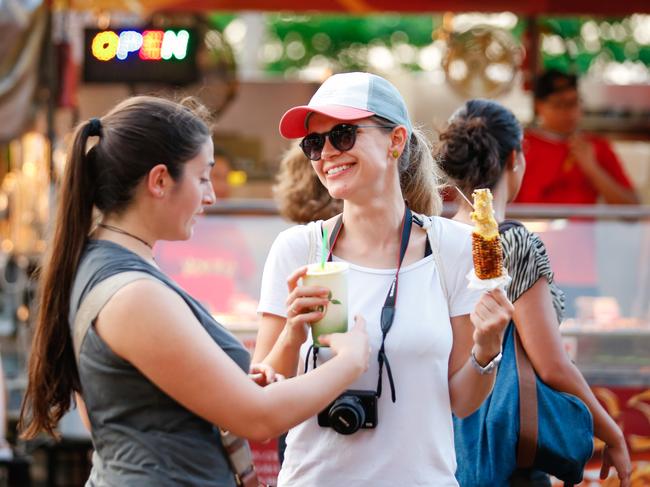 Alice Baronci (L) and Nicole Castle at the last Mindil Beach Market for 2019.Picture GLENN CAMPBELL