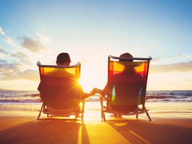 ESCAPE: Romance, Paul Ewart -  Retirement Vacation Concept, Happy Mature Retired Couple Enjoying Beautiful Sunset at the Beach . Picture: iStock