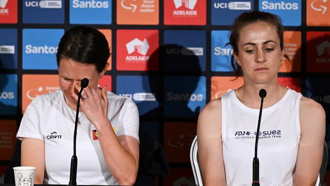 Champion Aussie cyclist Amanda Spratt breaks down next to teammate Grace Brown. Picture: Tim de Waele/Getty Images)