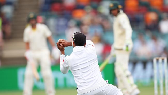 Sri Lanka’s Kusal Mendis takes the catch to dismiss Australia’s Usman Khawaja yesterday. Picture: Phil Hillyard