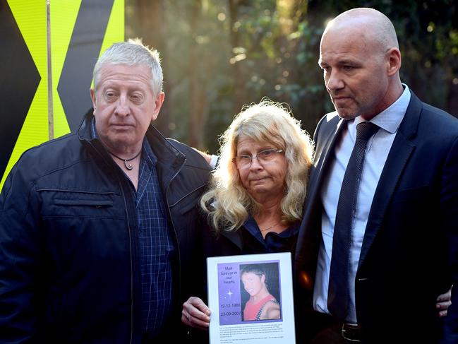 Jubelin (right) with Mark and Faye Leveson, whose son Matthew’s remains were found in the Royal National Park ten years after he vanished. Picture: Dean Lewins.