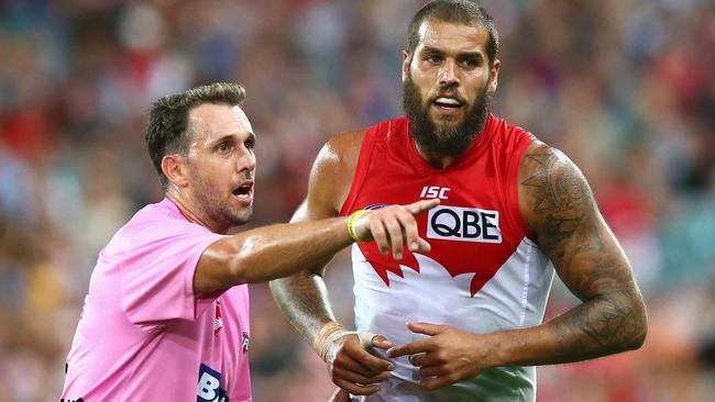 Lance Franklin talks to Sydney runner Nick Davis last year. Picture: Getty Images