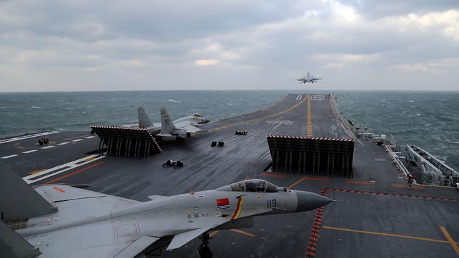 Chinese J-15 fighter jets on the deck of the Liaoning aircraft carrier in the Yellow Sea, off China's east coast. Picture: AFP