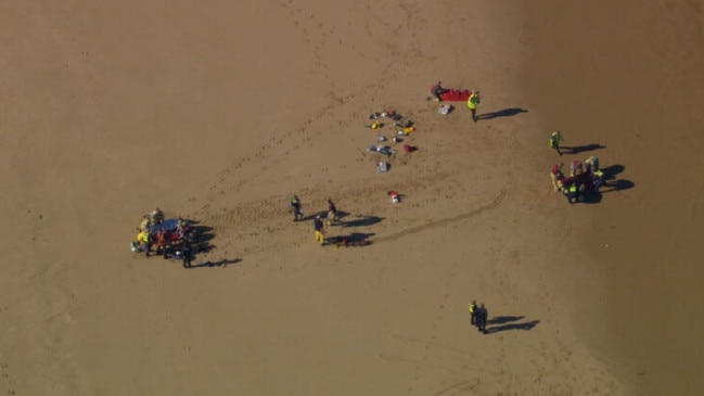 Emergency crews rushed to Point Lonsdale after three people were seriously injured in a helicopter crash off the coast. Picture: 9News