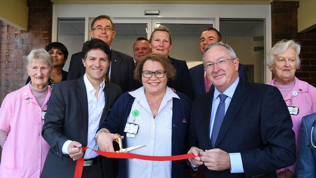 Ryde State Liberal MP Victor Dominello (front row, left), Nursing Unit Manager Leah Whitton (front row, centre), Health Minister Brad Hazzard (front row, right). Picture: AAP/Keri Megelus