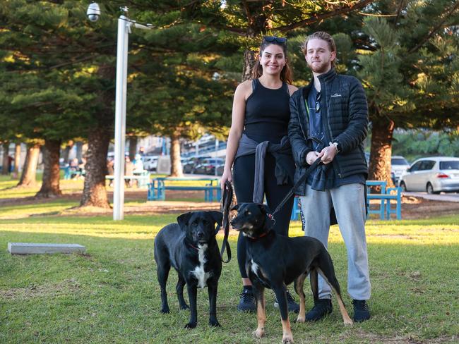 First home buyers Farah Jpour, with Luna and Milan Bosnjak, with, Max, at Coogee Beach. The pair want to buy a home but would be priced out of the market if they had to pay stamp duty. Picture: Justin Lloyd.