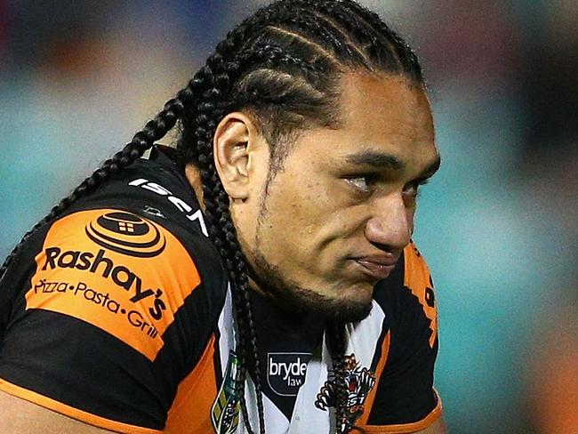 SYDNEY, AUSTRALIA - JUNE 05: Martin Taupau of the Tigers looks dejected during the round 13 NRL match between the Wests Tigers and the Gold Coast Titans at Leichhardt Oval on June 5, 2015 in Sydney, Australia. (Photo by Cameron Spencer/Getty Images)