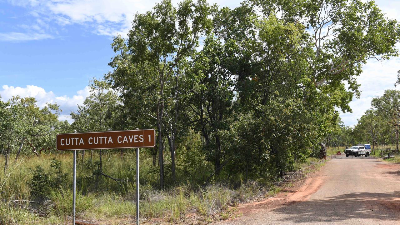 Police guard the gates to Cutta Cutta Caves. Picture: (A)manda Parkinson