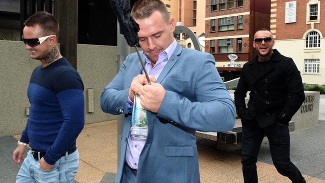 (L to R) Zivko Stojakovic, Benjamin Thornton and George Bejat leave the Magistrates Court in Brisbane. Picture: AAP Image