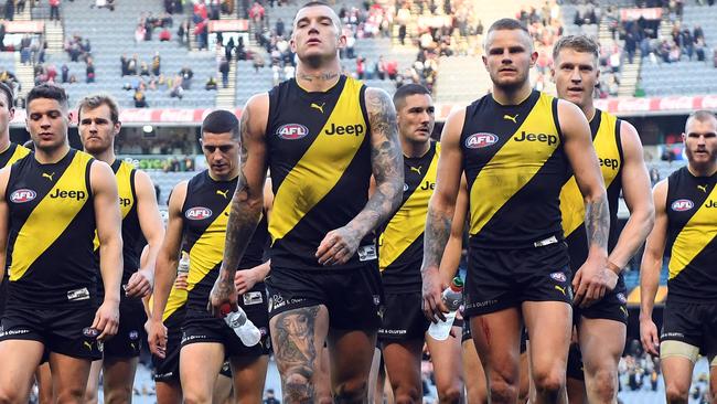 Richmond players leave the MCG after Saturday’s loss to Sydney. Picture: Getty