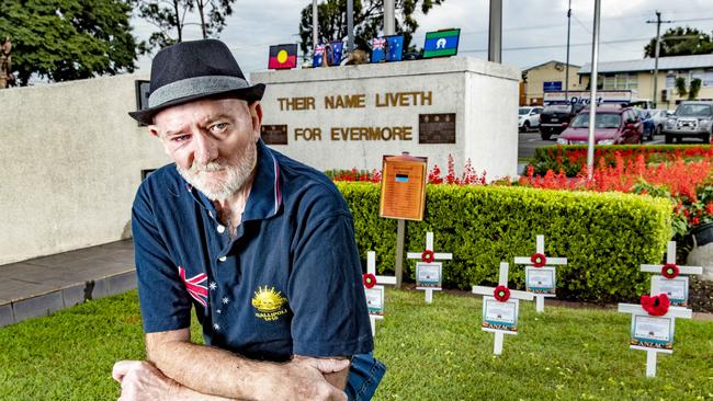 Logan historian Mic Noble with his ANZAC display at Logan Cenotaph in April 2021. Picture: Richard Walker