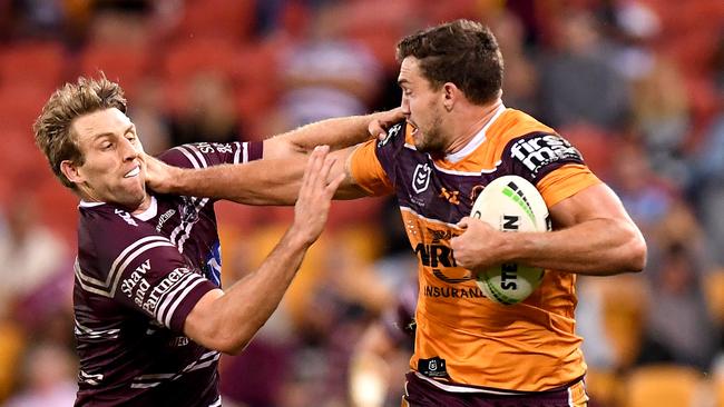 BRISBANE, AUSTRALIA - MAY 10: Corey Oates of the Broncos breaks away from the defence during the round nine NRL match between the Manly Sea Eagles and the Brisbane Broncos at Suncorp Stadium on May 10, 2019 in Brisbane, Australia. (Photo by Bradley Kanaris/Getty Images)