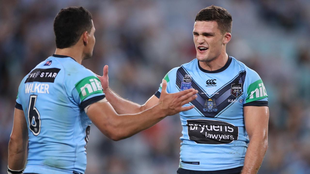 Nathan Cleary and Cody Walker celebrate NSW’s win. (Photo by Mark Kolbe/Getty Images)