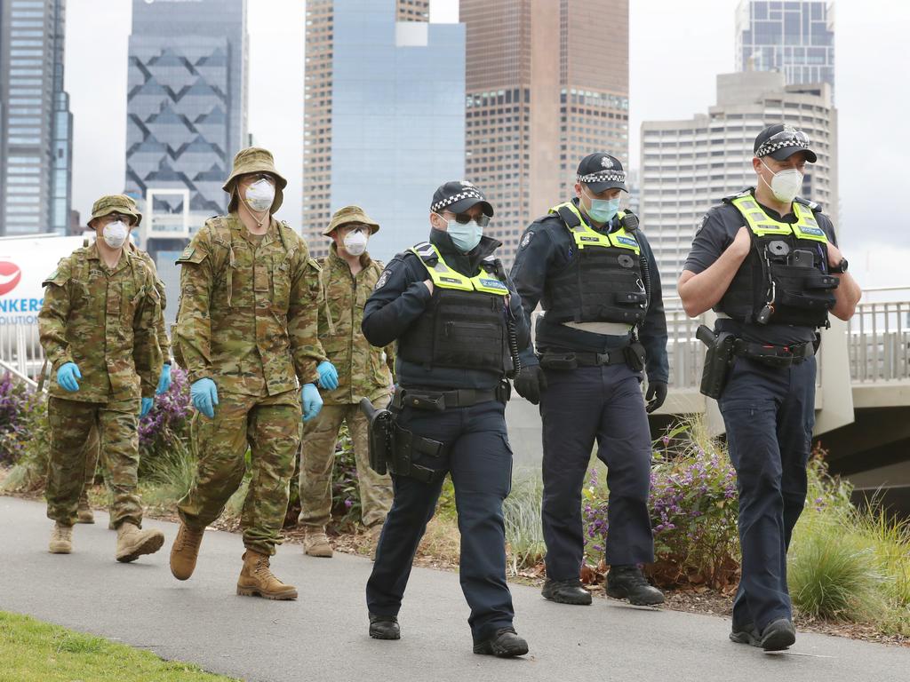 ADF and police patrol along the Yarra River in Melbourne. Picture: NCA NewsWire / David Crosling