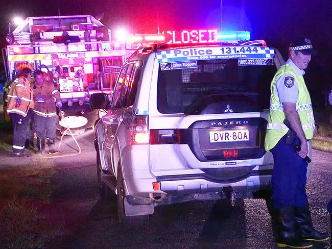 Residents are evacuated after septic tanks overflowed in the Mid North Coast town of Stuarts Point. A biohazard was declared and Fire and Rescue NSW assisted residents to a nearby youth centre for decontamination. Photo courtesy of Nine News.