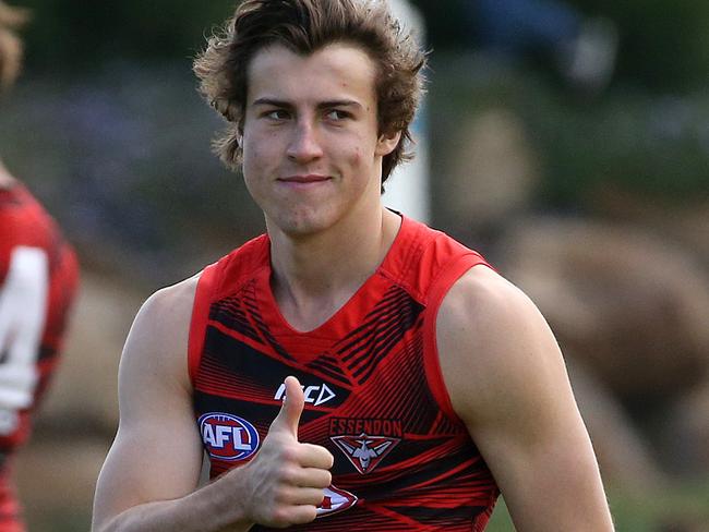 Essendon training at Tullamarine. thumbs up from number 1 draft pick Andrew McGrath .Pic : Michael Klein