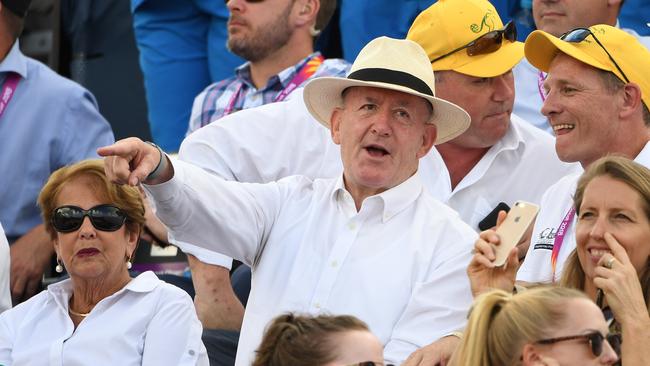 Australia's Governor General Sir Peter Cosgrove (centre) and his wife Lady Cosgrove attend the women's beach volleyball preliminary match between Australia and Cyprus. Photo: AAP