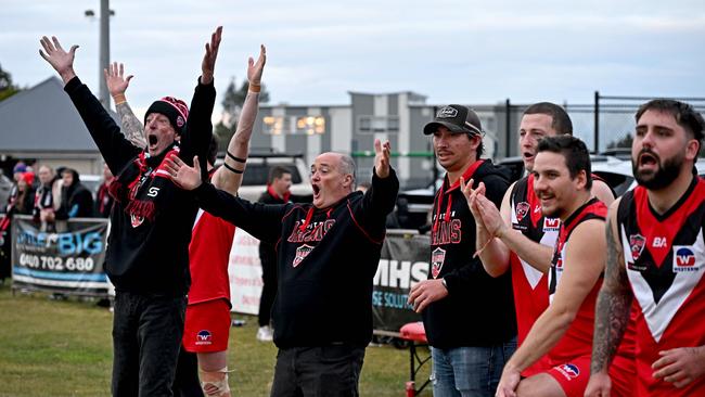 Celebrations started on the bench. Picture: Andy Brownbill