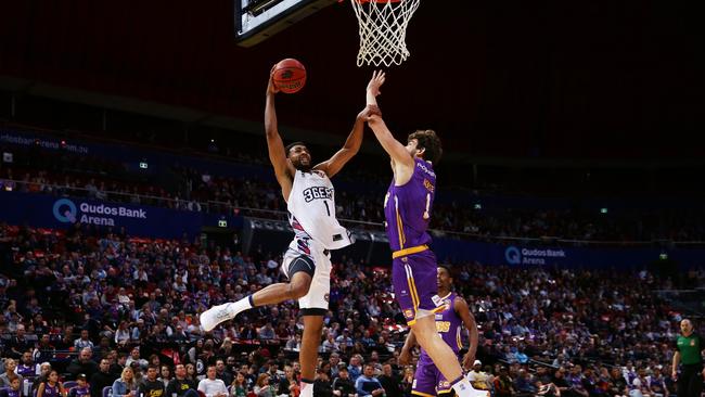 Obi Kyei drives to the basket against Sydney on NBL debut. Picture: Matt King(Getty)