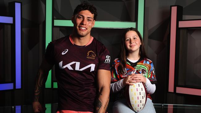 11 year-old interviewer Sophie Fraser with Brisbane Broncos player Jordan Riki for The Tiny Edition. Picture: Liam Kidston