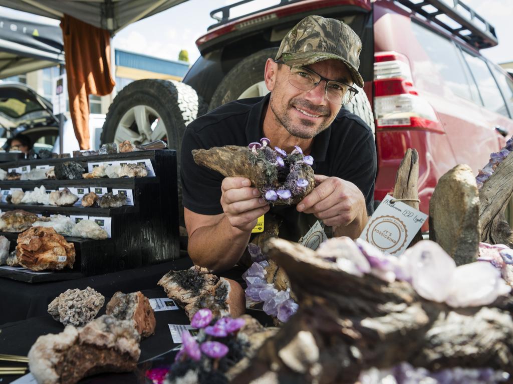 Jamie Turnbull of JT's Fossicking with crystal and mushroom lamps on sale at his stall at Gemfest hosted by Toowoomba Lapidary Club at Centenary Heights State High School, Saturday, October 21, 2023. Picture: Kevin Farmer