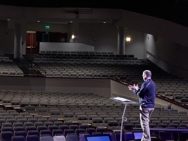 Senior Pastor Troy Dobbs speaks to empty pews after Grace Church Eden Prairie decided to present worship music and the sermon to an estimated 3500 online viewers in Eden Prairie, Minnesota. Picture: Getty Images/AFP