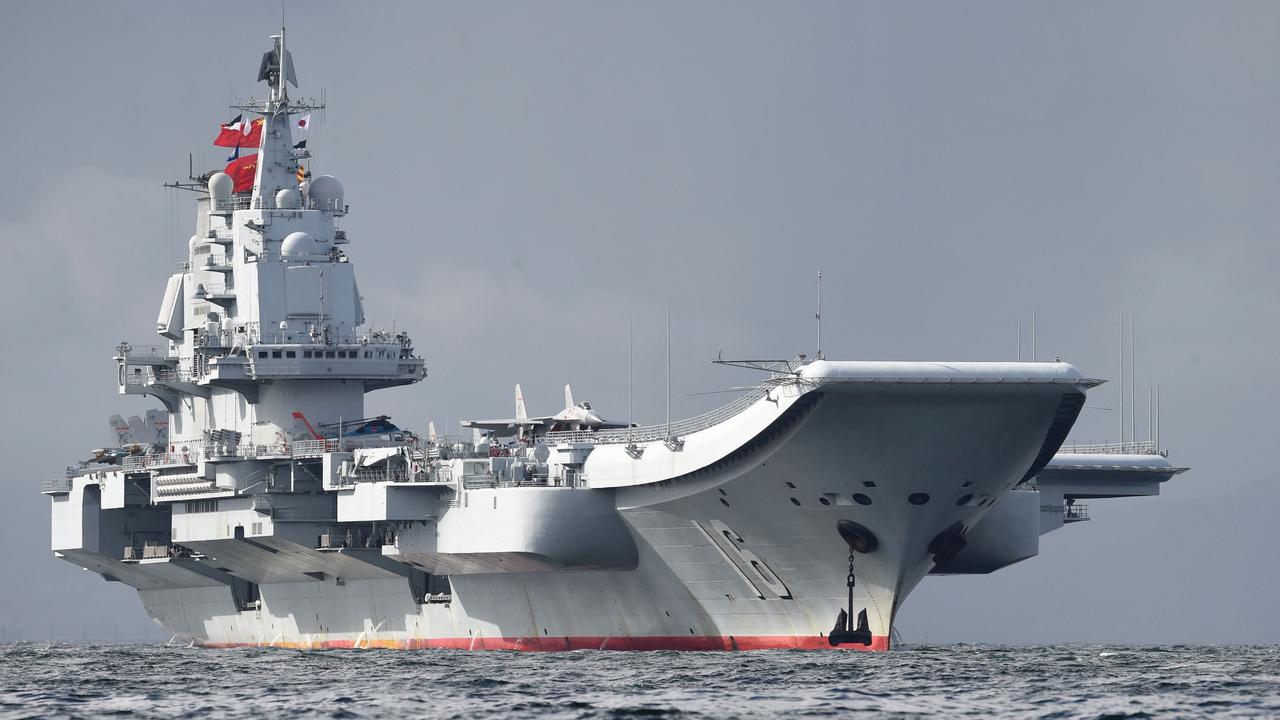 China's aircraft carrier the Liaoning. (Photo by Anthony WALLACE / AFP)