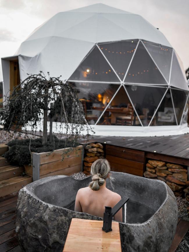 An outdoor bath adds to the luxury of Luna Lodge. Picture: Declan Dreyer