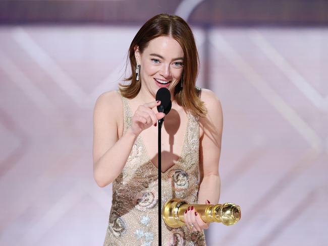 Emma Stone accepts the award for Best Performance by a Female Actor in a Motion Picture Musical or Comedy for Poor Things. Picture: Getty Images