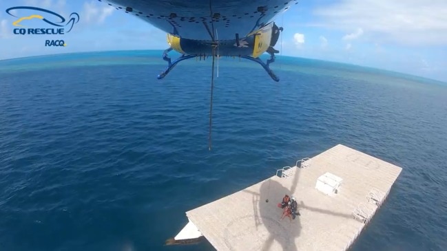 Rescue helicopter winches shark attack victim: VIDEO: RACQ CQ Rescue