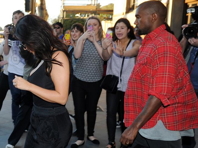 Fans mob Kimye as they leave Jamie’s Italian restaurant in King William St. Picture: Naomi Jellicoe