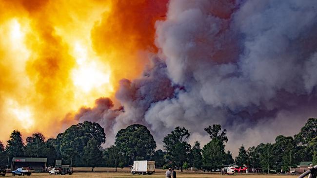 The monstrous fire advanced towards town. Picture: Daniel Shaw and Timothy Dean