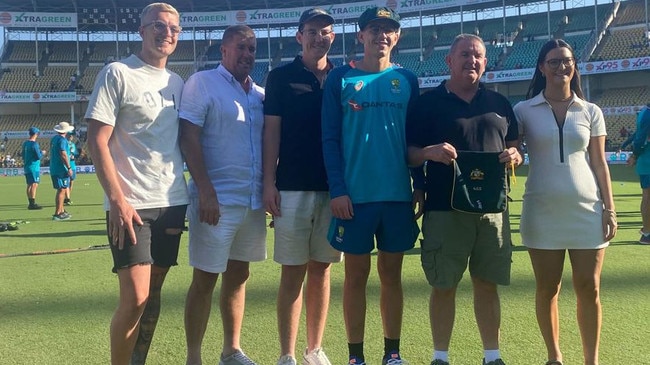 Todd Murphy with family after he was presented with his baggy green.