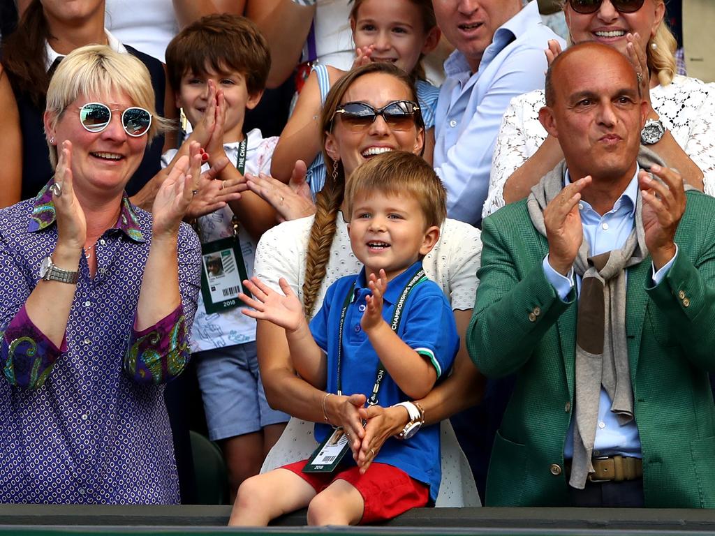 Stefan Djokovic applauds his dad after the men’s singles final. (Photo by Michael Steele/Getty Images)