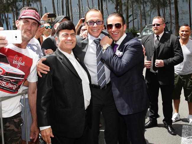 Action movie star Jean-Claude Van Damme with United Cinemas chairman Roy Mustaca and his son Sam Mustaca. Picture: Troy Snook