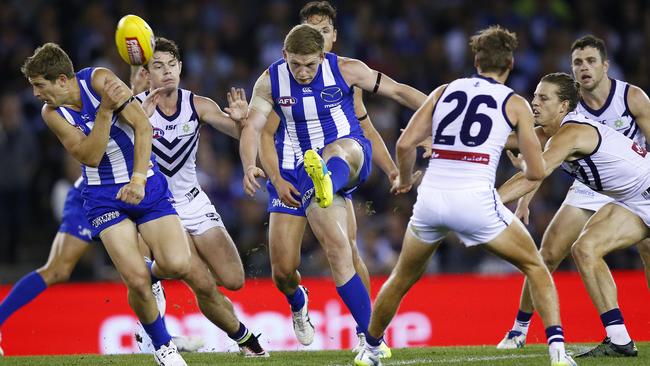North Melbourne vice-captain Jack Ziebell clears the ball out of the middle. Picture: Colleen Petch