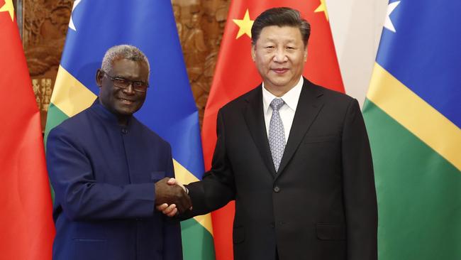 Solomon Islands Prime Minister Manasseh Sogavare with Chinese President Xi Jinping in Beijing in 2019. Picture: Getty Images