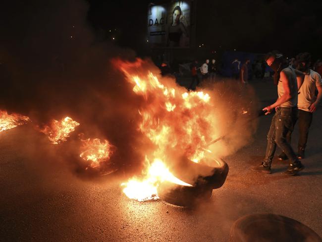 Palestinian demonstrators during an anti-Israel protest over tension in Jerusalem, near the Jewish settlement of Beit El near Ramallah. Picture: AFP