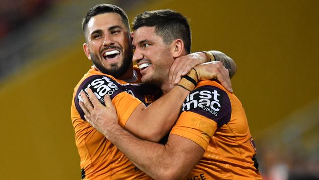 Jack Bird celebrates a Matt Gillett try before his devastating knee injury. Picture: AAP Image/Darren England