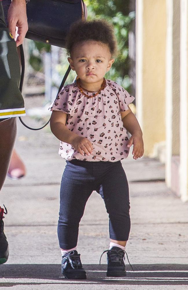 Alexia Olympia, 1, looks seriously cute toddling her way down the footpath wearing Nike sneakers like her mum. Picture: Media Mode