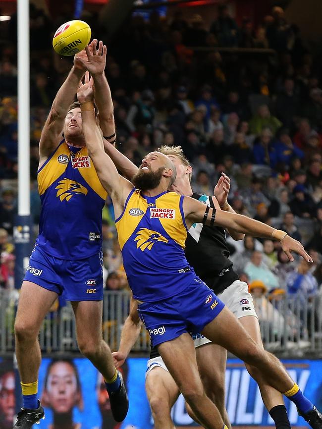 Todd Marshall makes the contest to heap pressure on West Coast star Jeremy McGovern. Picture: Paul Kane/Getty Images