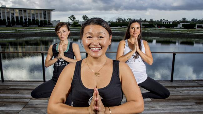 Yoga instructor Judes Yang, pictured with Sarah Breakspear and Ashleigh Green, will open her own yoga studio called State of Sahaja.