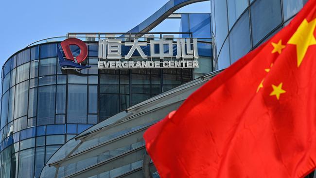 Distressed developer China Evergrande will reportedly sell a half-stake in its property management unit to Hopson Development. Picture: Hector Retamal / AFP