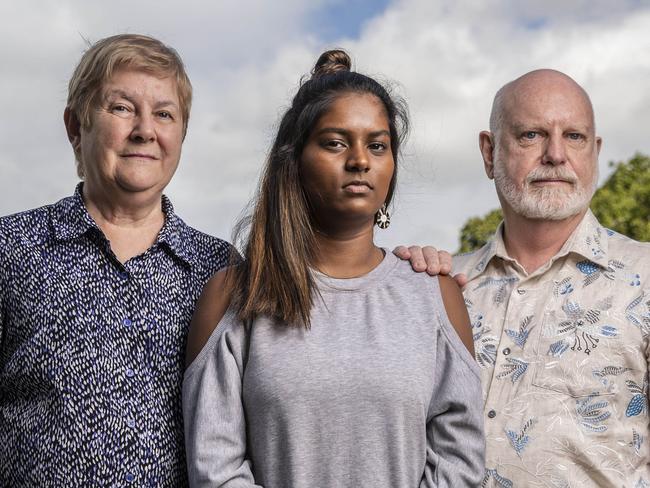 8th June 2018.Parents Anthony Woolley(right) and Janet Kencian(left) with their daughter Gowri(centre),  pose for a portrait in New Farm. The family was sued for defamation by principal of school after the parents complained of inadequate response to complaint of bullying of Gowri. Principal's name is Christopher Daunt Watney.Photo: Glenn Hunt / The Australian