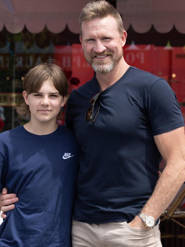 Nathan Buckley and son Ayce in 2023. He says being a dad is his hardest job. Picture: Fiona Hamilton