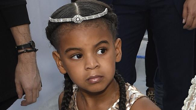 FILE - In this Aug. 28, 2016 file photo, Blue Ivy, daughter of Beyonce, arrives at the MTV Video Music Awards at Madison Square Garden in New York. At just 7, Blue Ivy Carter is an award-winning songwriter. Jay-Z and BeyoncÃ©â€™s daughter won the Ashford & Simpson Songwriterâ€™s Award at the Soul Train Awards on Sunday, Nov 17, 2019, for co-writing her momâ€™s hit â€œBrown Skin Girl,â€&#157; a song celebrating dark- and brown-skinned women. Ivy gives a vocal performance that opens and closes the song, which also features Wizkid and Saint Jhn.(Photo by Chris Pizzello/Invision/AP, File)