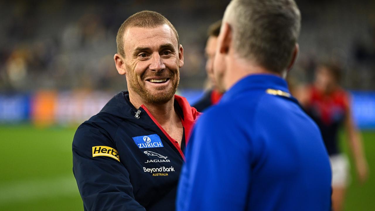 Simon Goodwin chats with Adam Simpson after the match between the West Coast Eagles and the Melbourne Demons at Optus Stadium.