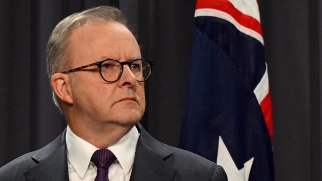 Australian Prime Minister Anthony Albanese (left) and ASIO Director-General Mike Burgess speak during a press conference at Parliament House in Canberra, Monday, August 5, 2024. (AAP Image/Lukas Coch) NO ARCHIVING