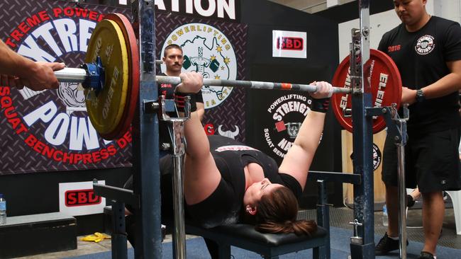 Najat Khoury doing a bench press. Picture: Peter Kelly.