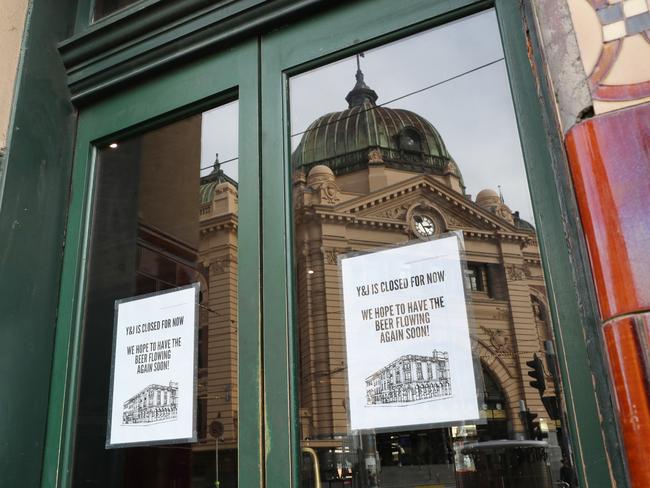 Melbourne’s Young and Jackson pub, in the CBD – pictured closed during one of stage four of Melbourne’s lockdowns in 2020 – has been identified as a Covid exposure site that a Mareeba woman attended on July 10. Picture: NCA NewsWire/ David Crosling